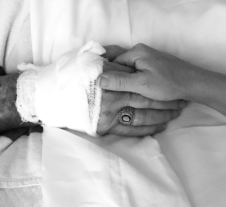 Holding my Daddy's hand during his last night with us...  (May 1, 2020)