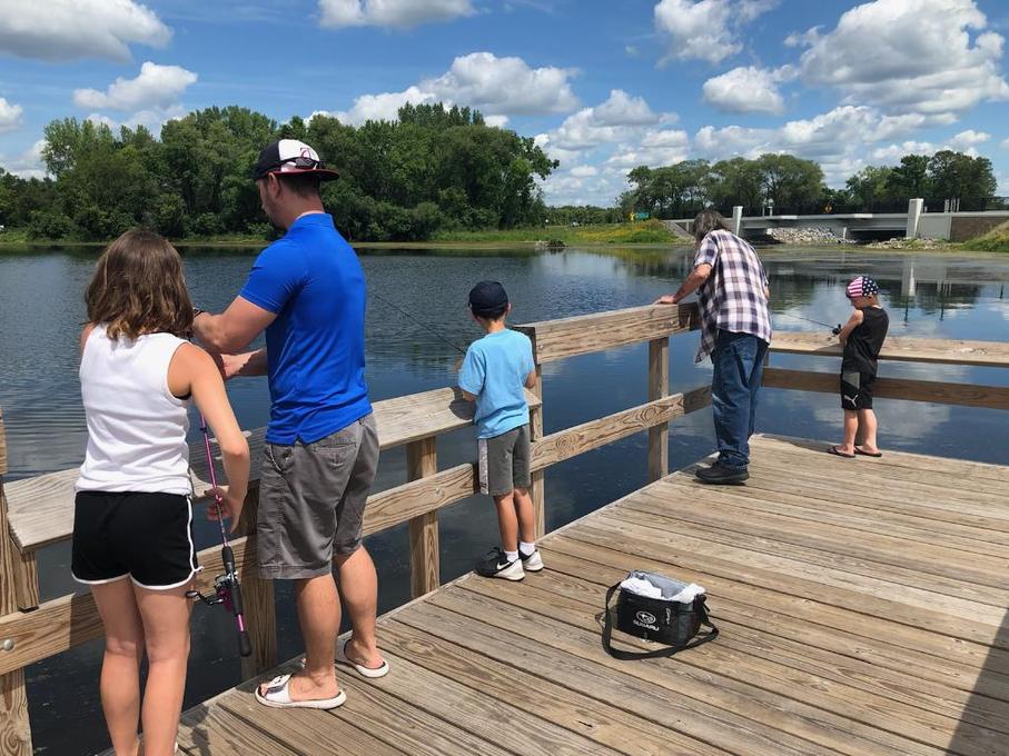 Fishing with his grandchildren