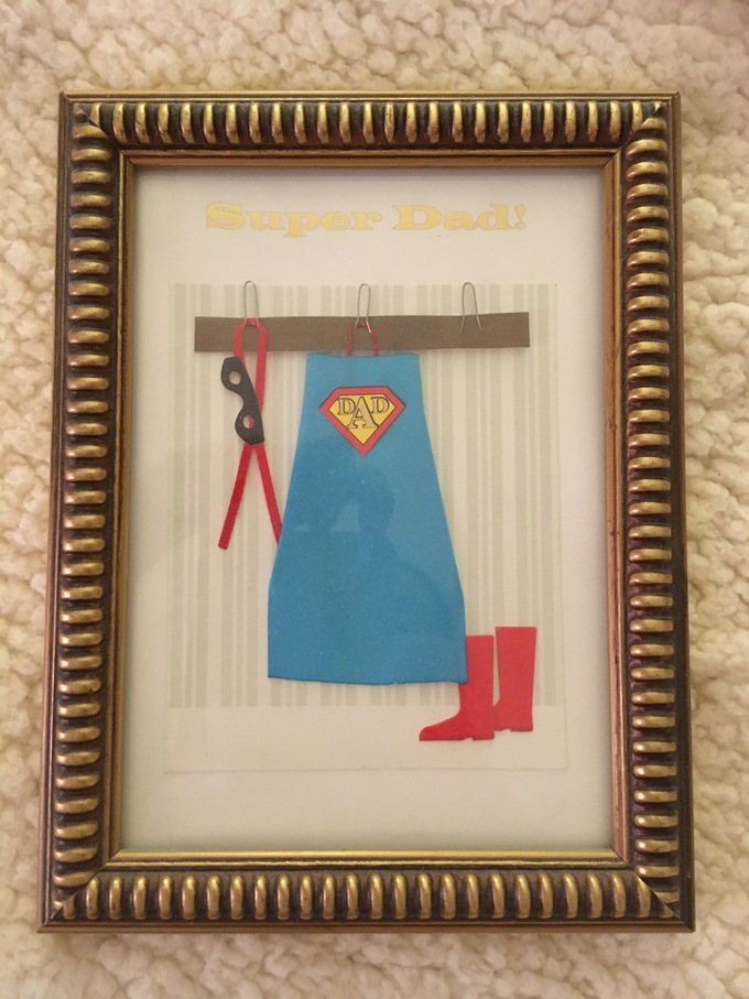 Super Dad.  A Father's Day card that I gave him many years ago, that he loved & framed. He kept this framed card by his bed for 