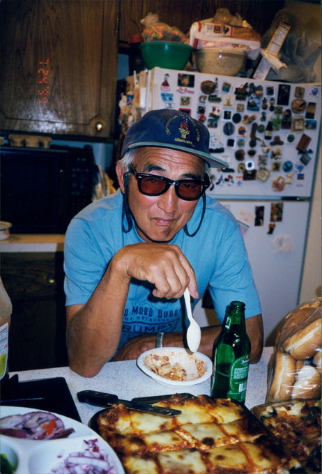 Carl enjoying a meal with his usual shades on