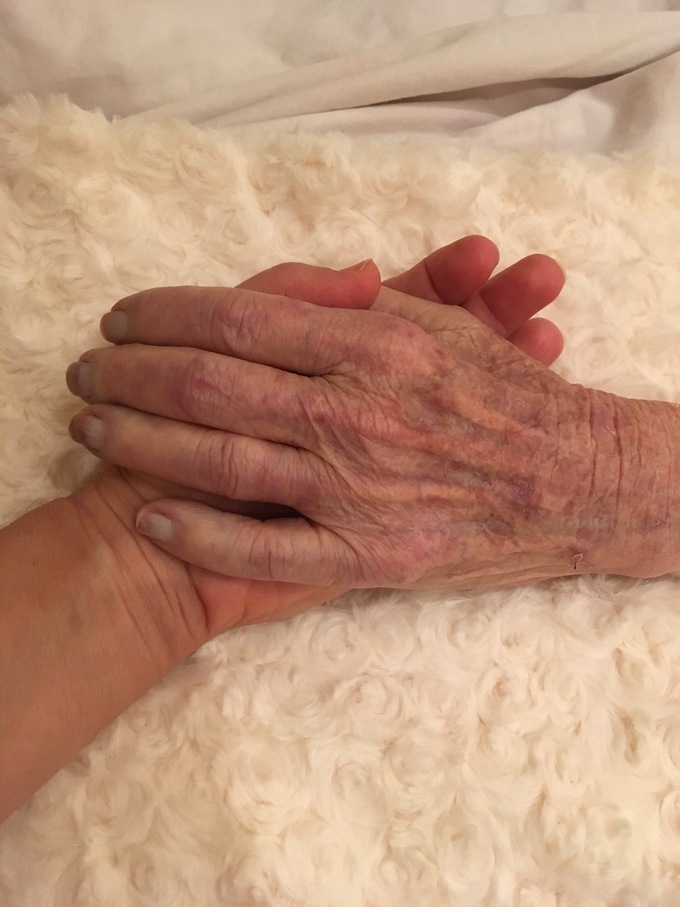 Holding my Mom's hand on her last night.  December 31, 2020. 