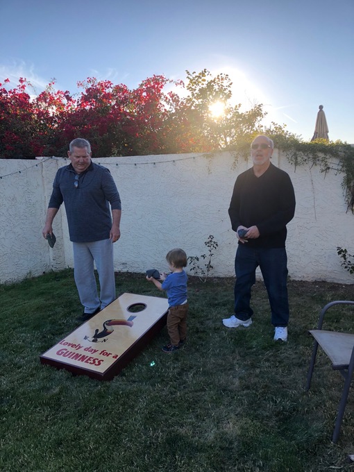 Papa Mike and James play cornhole 3/4/18