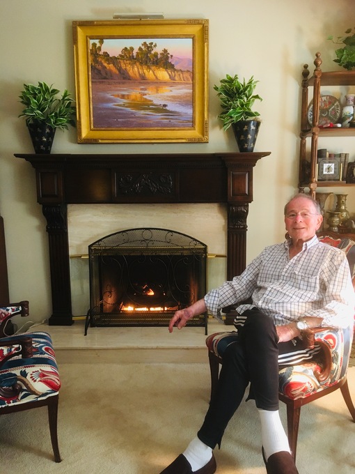 Peter sitting in his favorite room: in the living room next to the fireplace. March 2020.