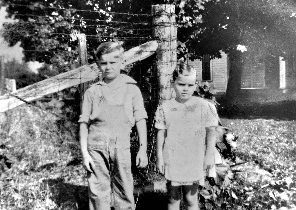 Barbara Jean and brother, Lloyd, on the farm. Circa 1939.