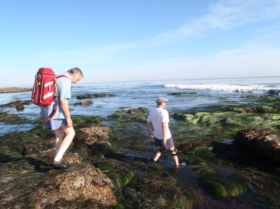 The red backpack, blue button down and boxers-classic Glenn