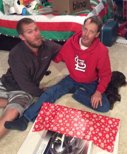 Dad and Dan wrapping Christmas Presents