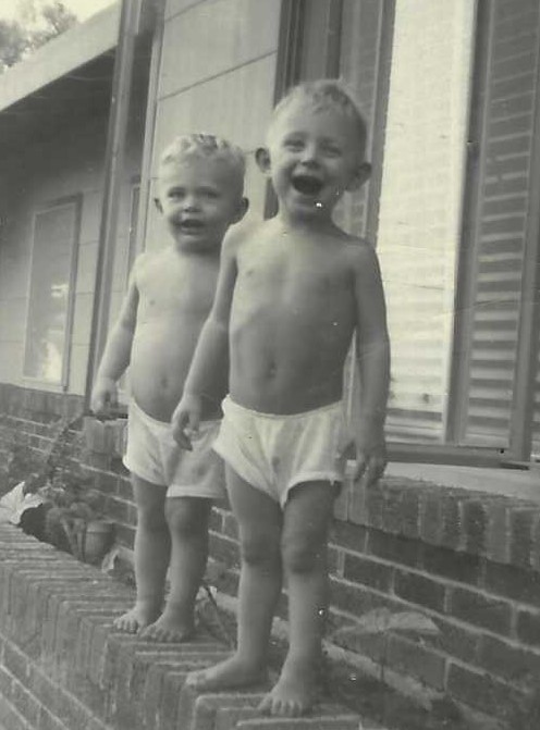 Brothers playing and laughing together.