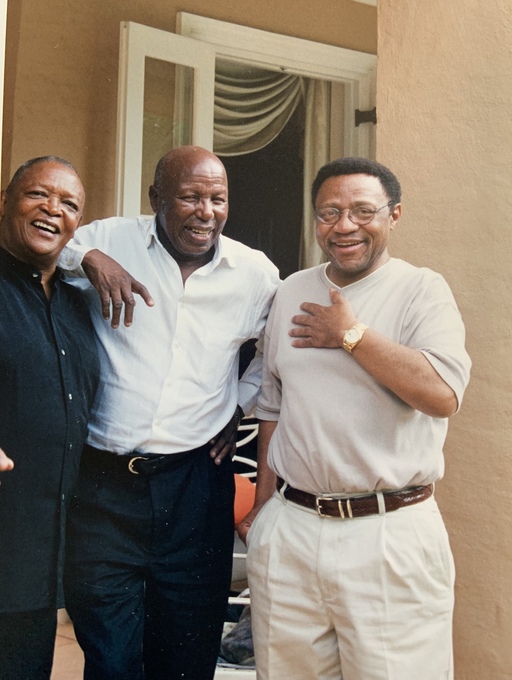 Isaac with friends, Hugh Masekela and Alf Kumalo
