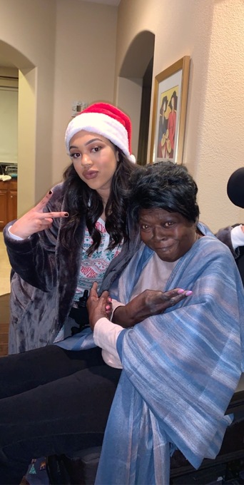 Dillyn and her "Nonnie" chuckin' up the peace sign.