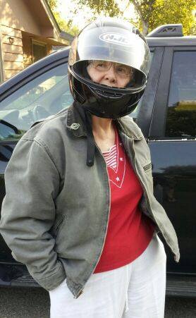 Mom reading to jump on Mike's bike