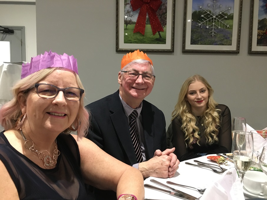 Keith, Caroline and daughter Lucy at a Christmas do