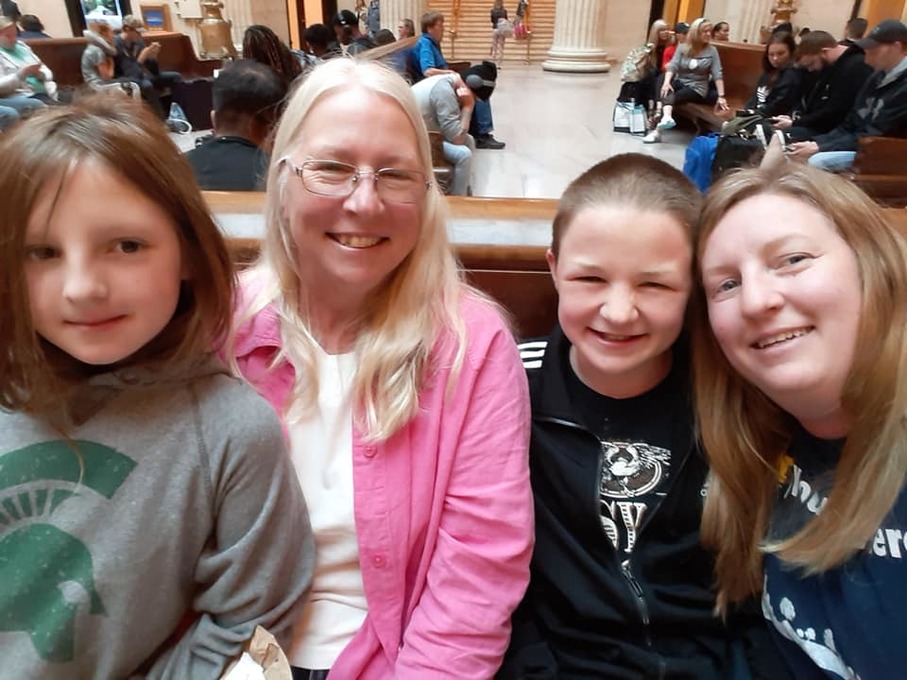 Sara with her mom and kids