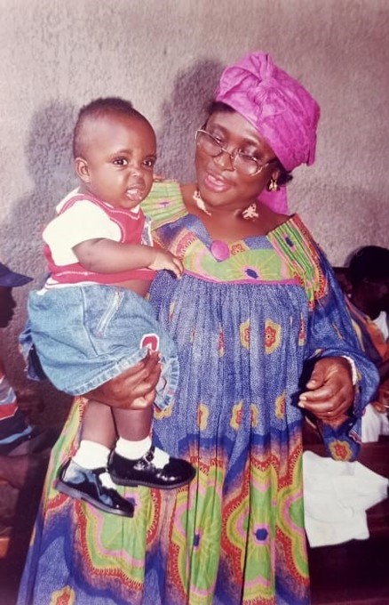 With granddaughter Egbe in Yaounde, 2005