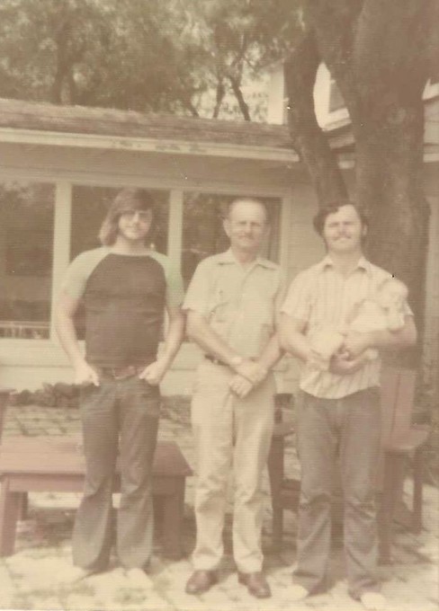 Bobby, Dad, and Charlie and little baby Doug Lum.