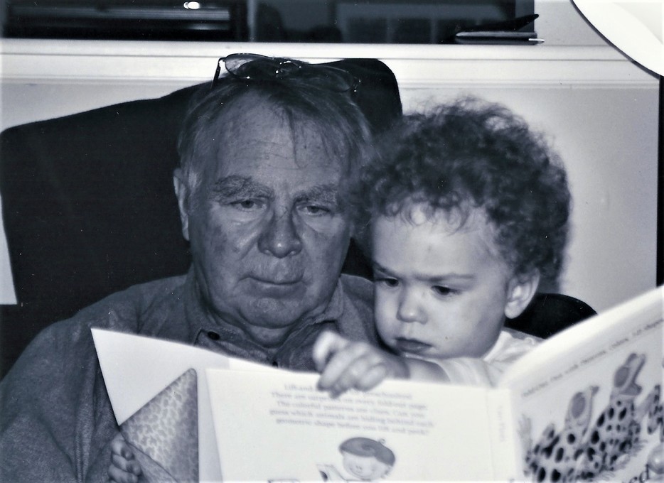 Arthur reading to baby Sophie