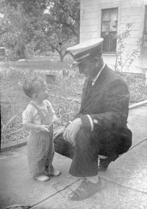 Charles as a toddler and his father, William Scouten
