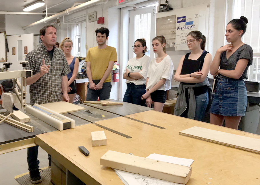 Sam training First-Year students in the shop!