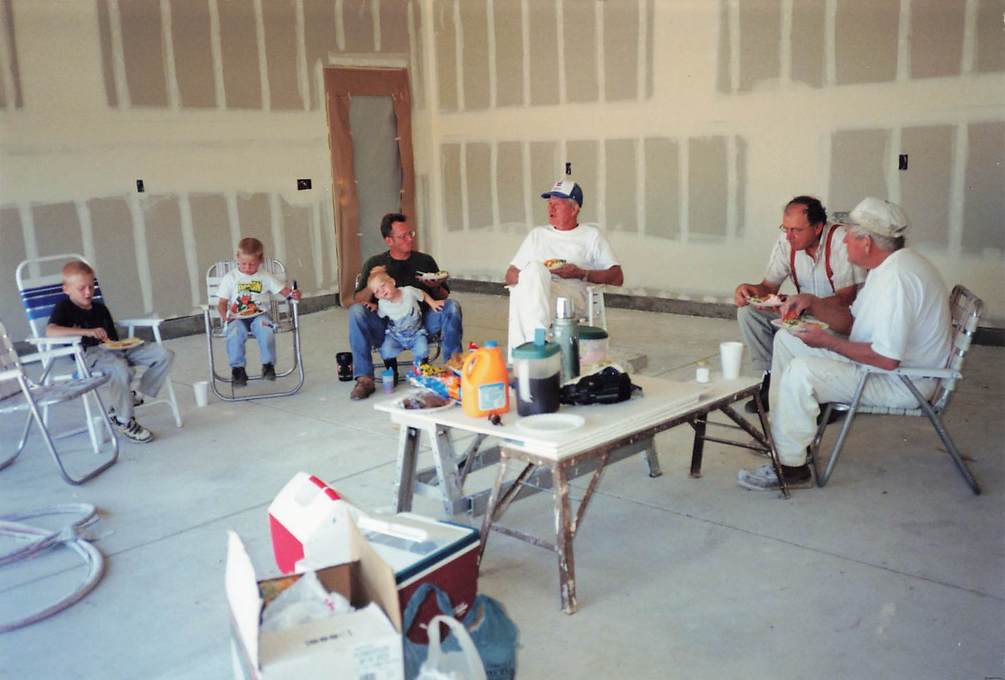 The construction crew taking a break in Rachel & Greg's newly taped garage!