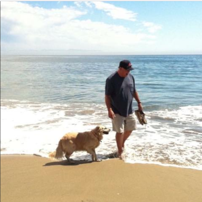 Bill with his golden retrievers in at Lighthouse Beach in Santa Cruz 