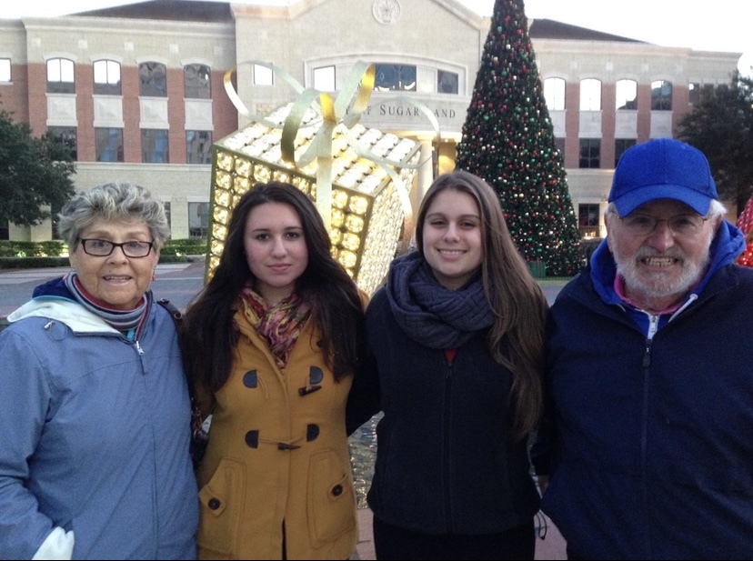 Aj and Dolly with grandchildren Kelsey and Jessie 