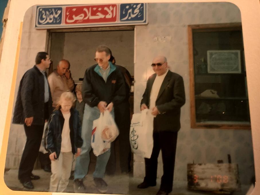 Mike and his daughter at the bakery in Alexandria, Egypt - 2001