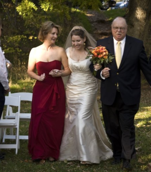 Walking his daughter Meghan down the aisle at her wedding