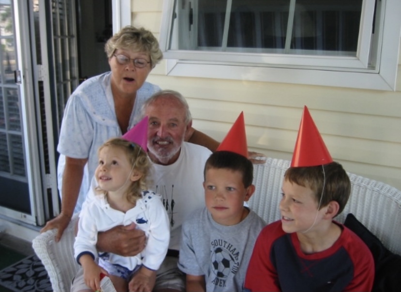 Aj and Dolly at Beach house with grandkids 