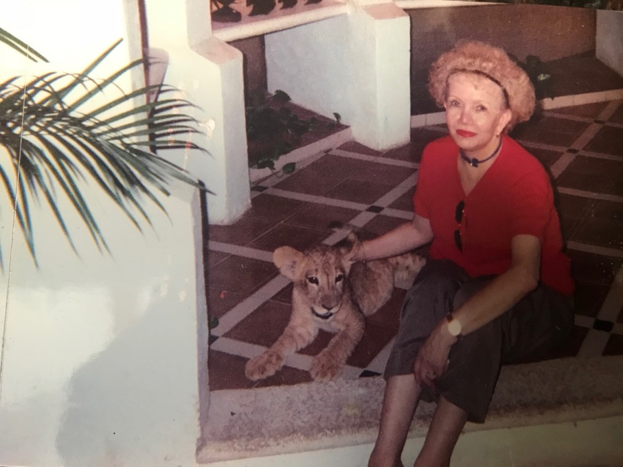 Gloria with rescue tiger in Cancun