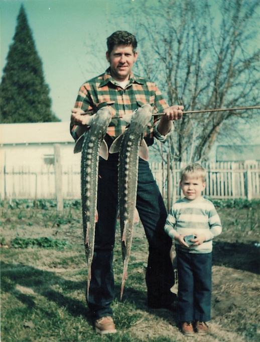 Howard & Aaron with sturgeon at Lorene & Latso Cole's back yard.