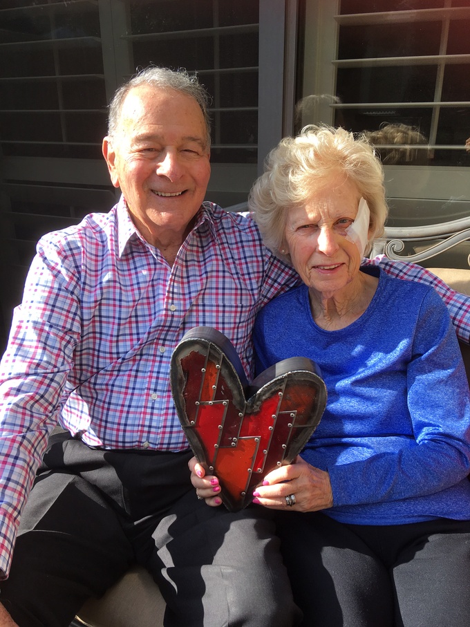 Mom & Dad with the metal heart art that I gave them for Christmas. Dec. 2017.