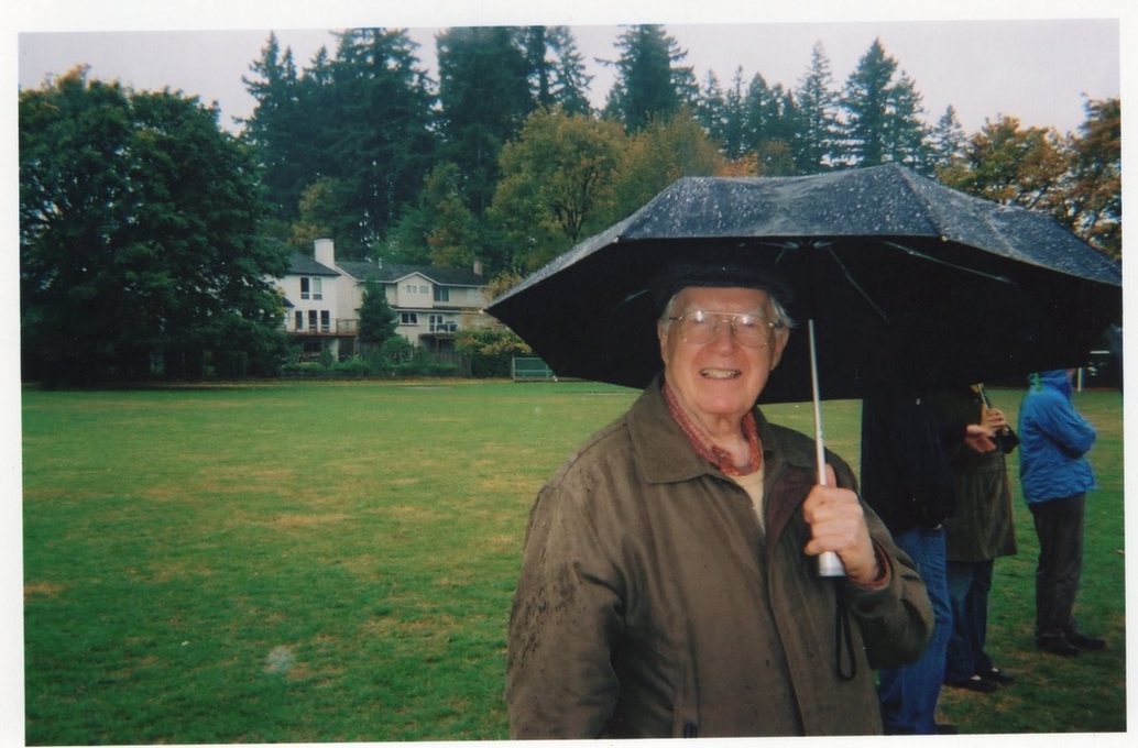 Bill braving the rain for a Henry game