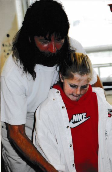 Coach Martin helping students at Hillside