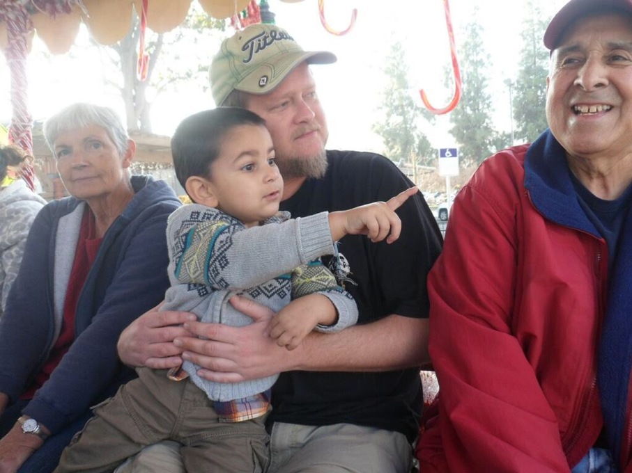 Evelyn, Zak (Son in Law), Arjan (Grandson) and Dan on the Christmas Trolley, Old Town Clovis