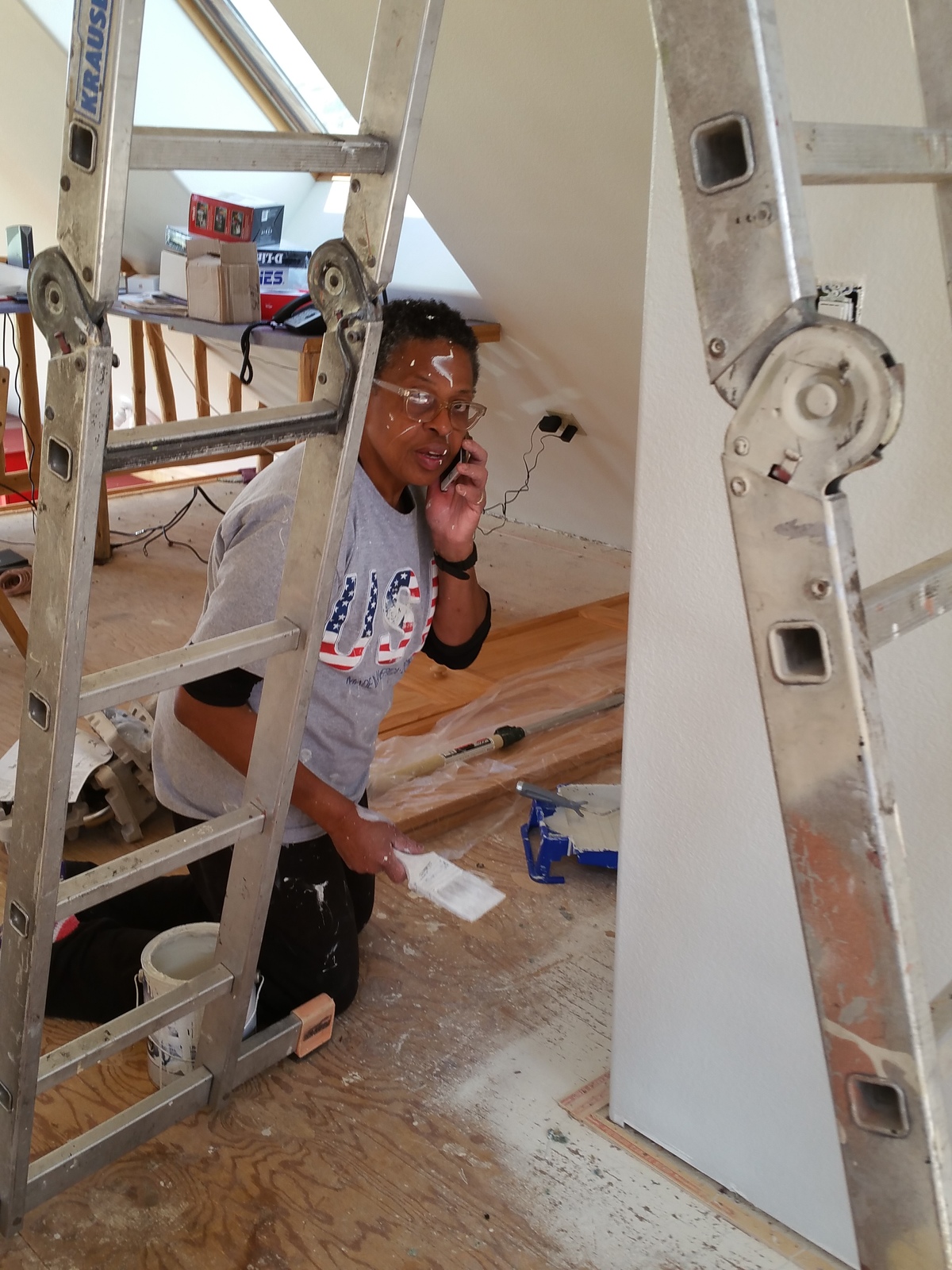 Donna painting the office.