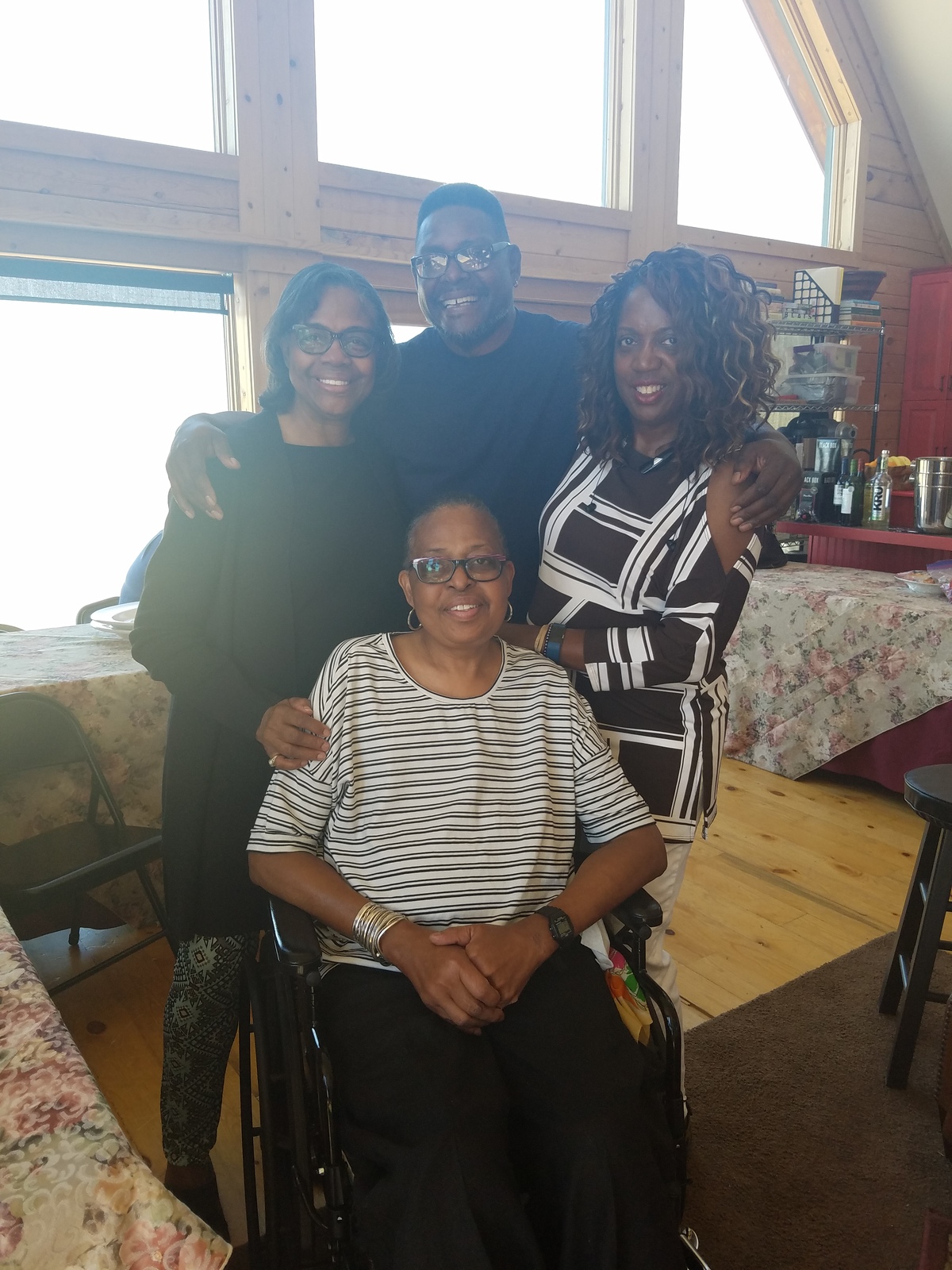 Donna with sister, Carla; family friend, Tim Gathers; and her lifelong friend (sister), Evie Clark 